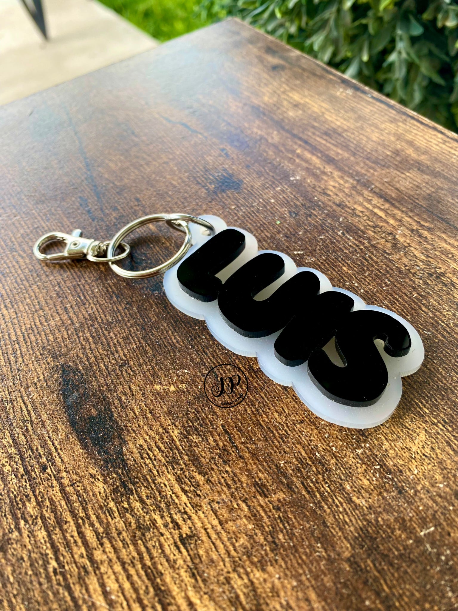 Black and frosted white acrylic keychain backpack tag