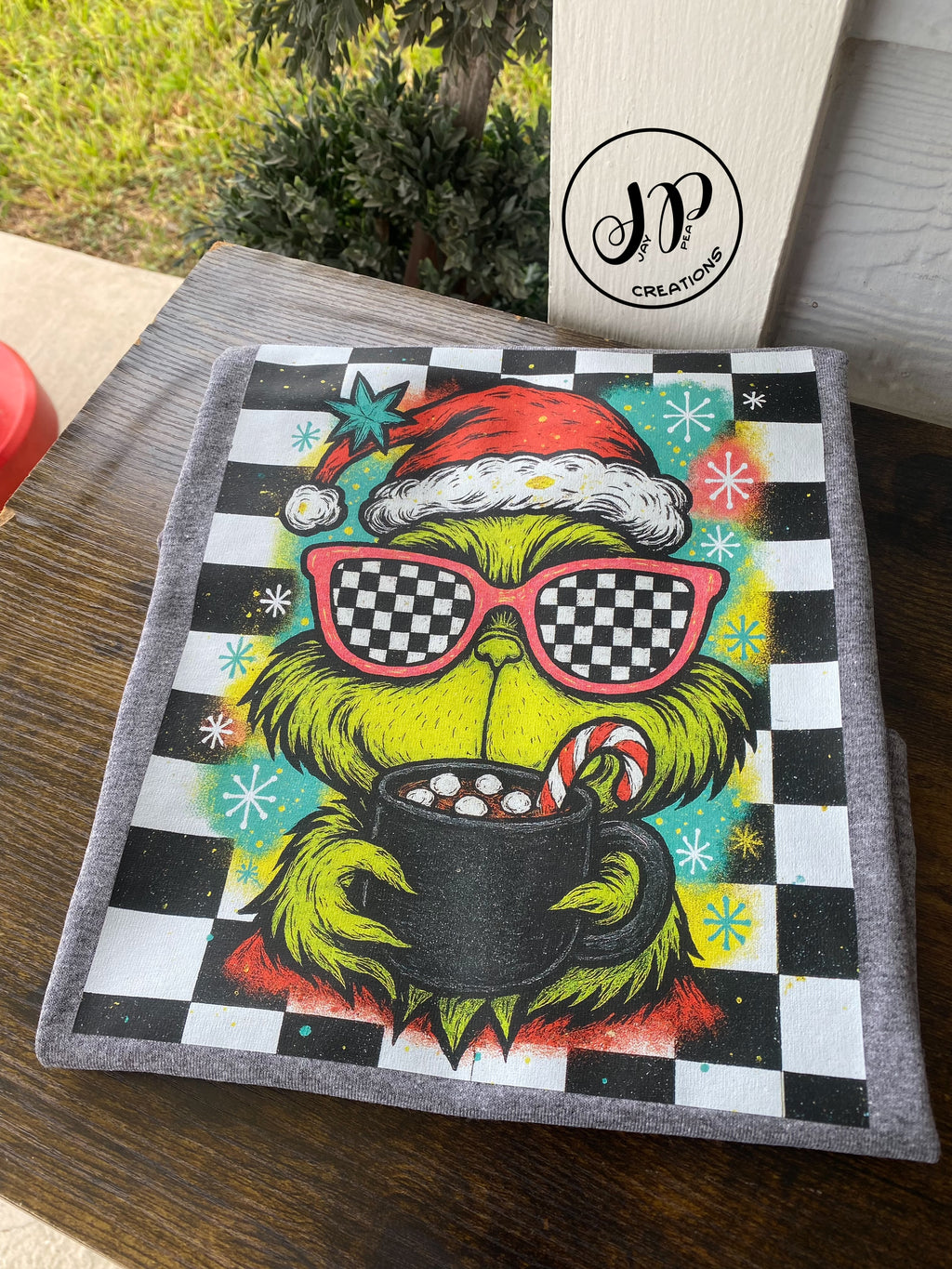 Grinch hot chocolate checkered tee